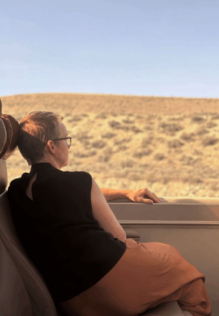 Jennifer gazing out the train window, reflecting on the journey behind Digital Simplified.